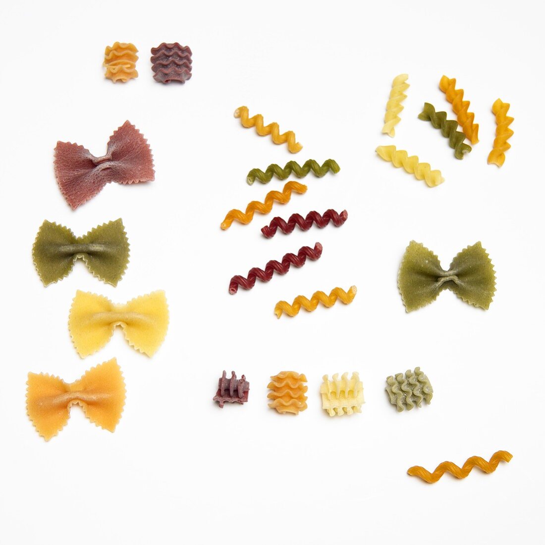 Various Types of Dried Pasta on White Background