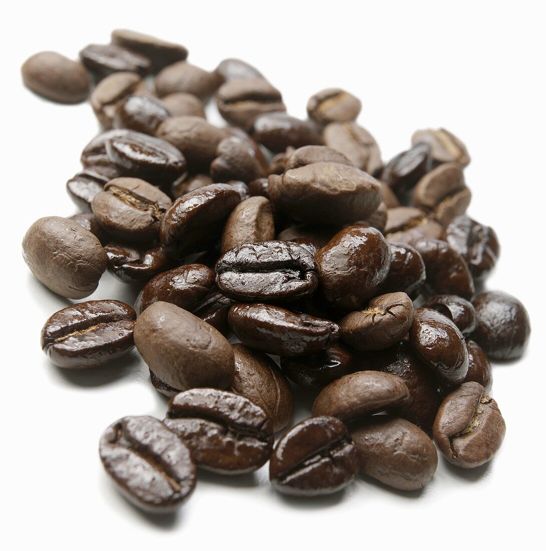 Coffee Beans on White; Close Up