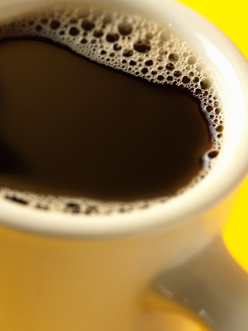 A Cup of Coffee in a White Mug, Close Up