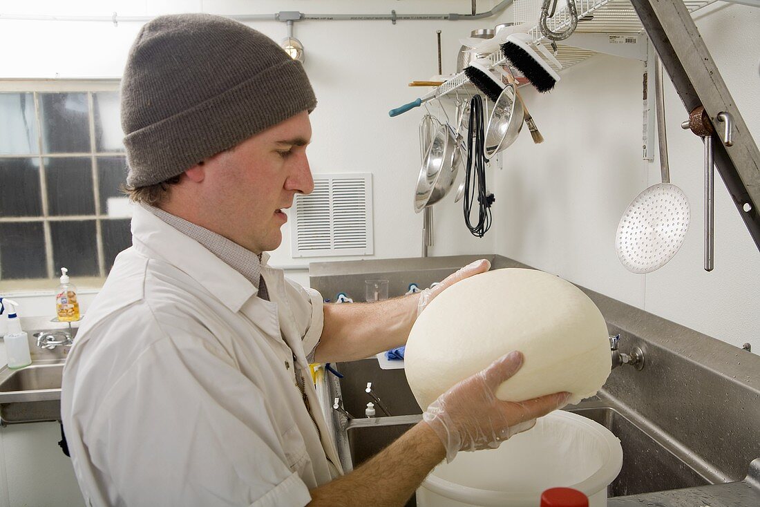 Man Pressing Curds