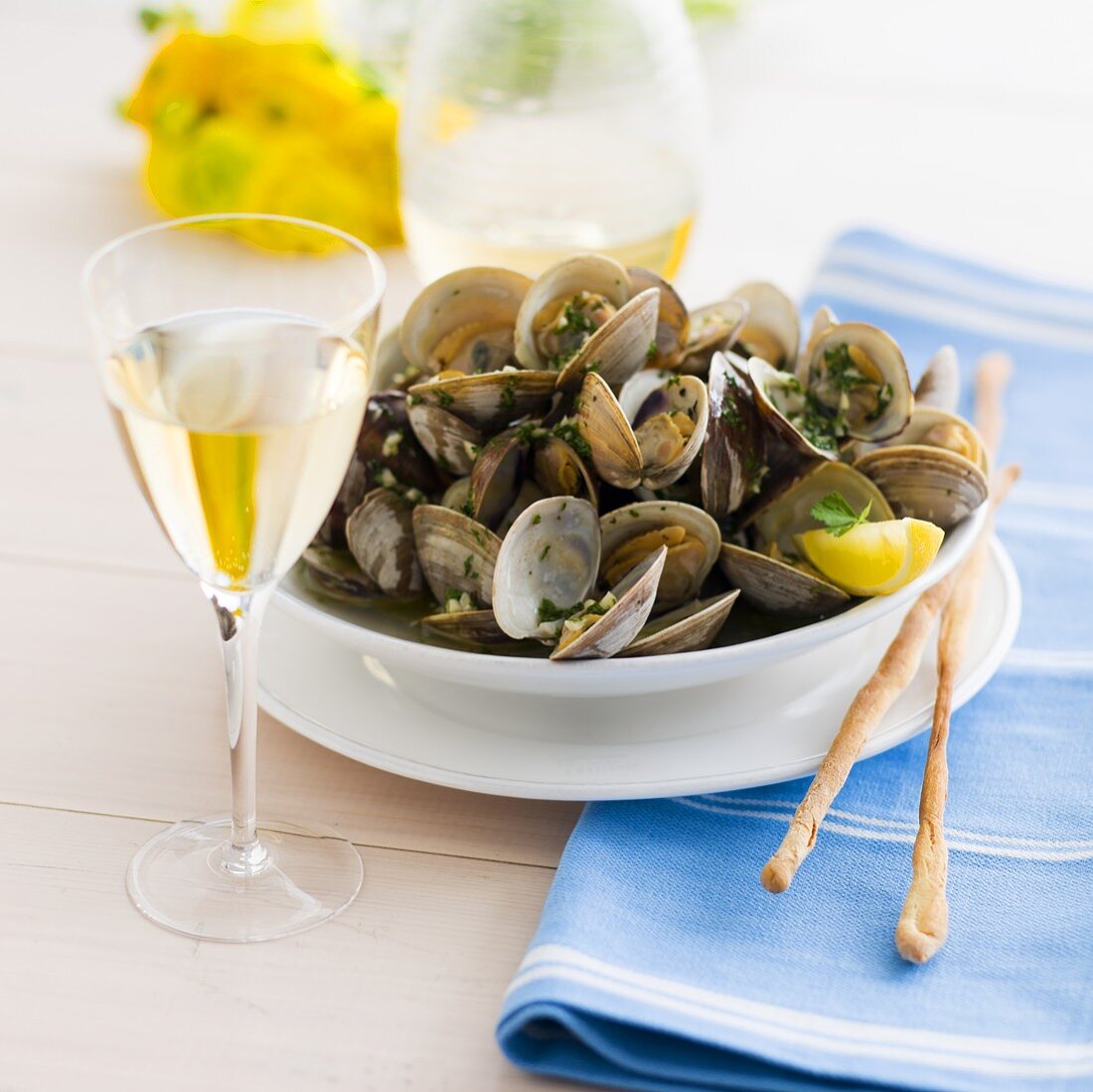 Bowl of Steamed Clams with Grissini and White Wine
