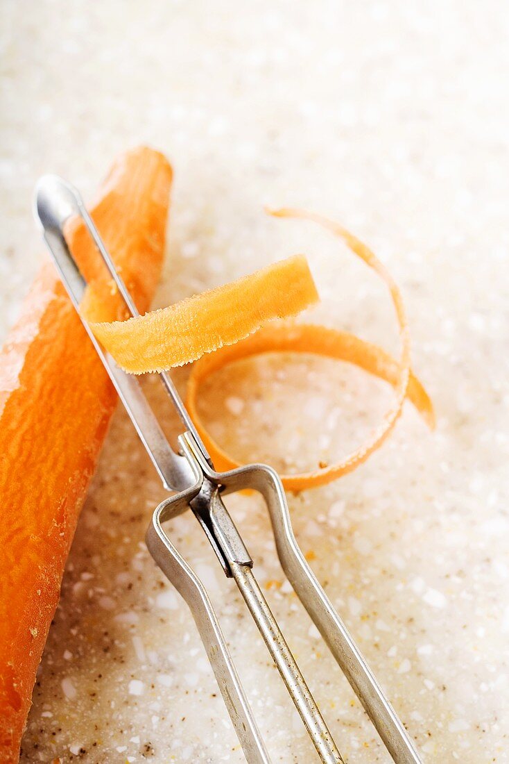 Organic Carrot being Peeled
