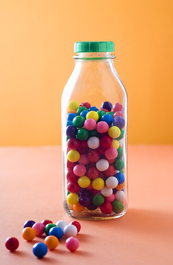 Retro Gumballs in and Beside a Bottle