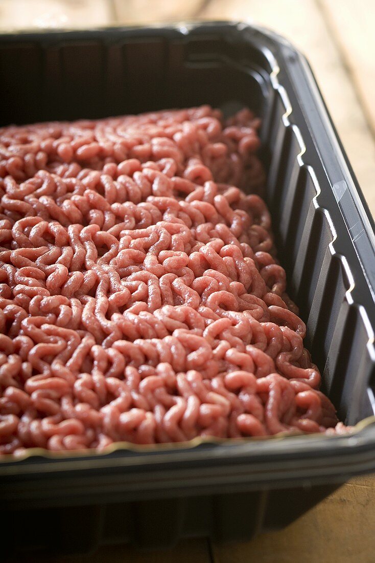 Raw Ground Beef in Plastic Container
