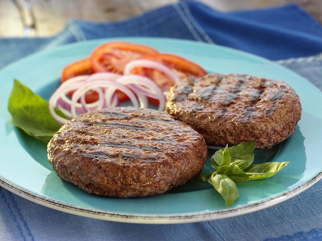 Two Grilled Beef Patties with Basil,Onions and Tomatoes