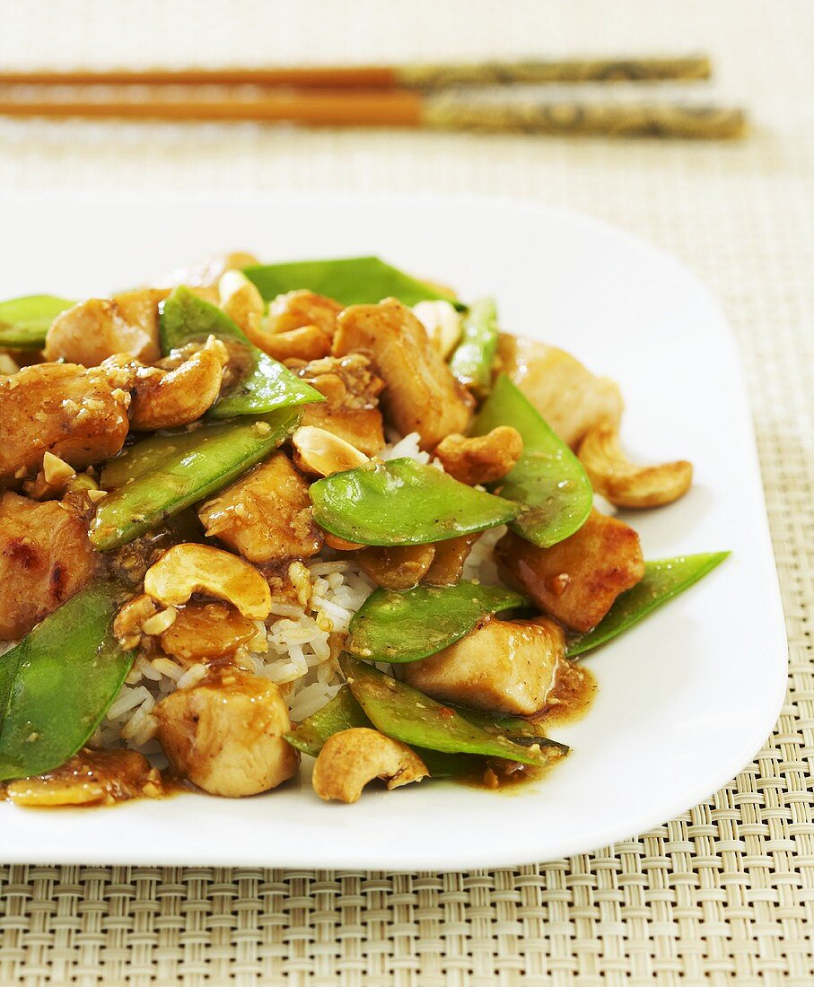 Cashew Chicken Stir Fry with Pea Pods over Rice