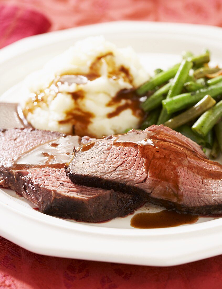 Sliced Roast Beef with Gravy, Mashed Potatoes and Green Beans