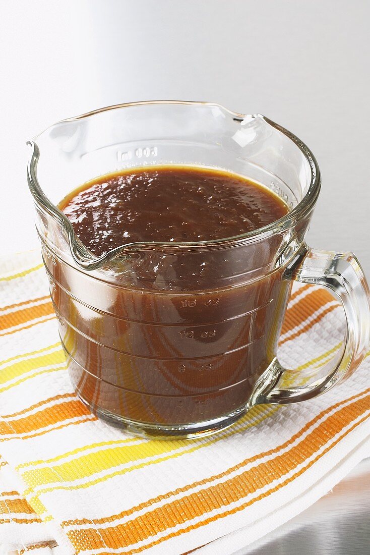 Homemade Barbecue Sauce in Glass Measuring Cup