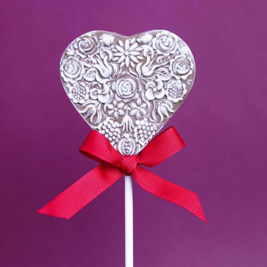 Milk and White Chocolate Heart Lollipop with Red Ribbon