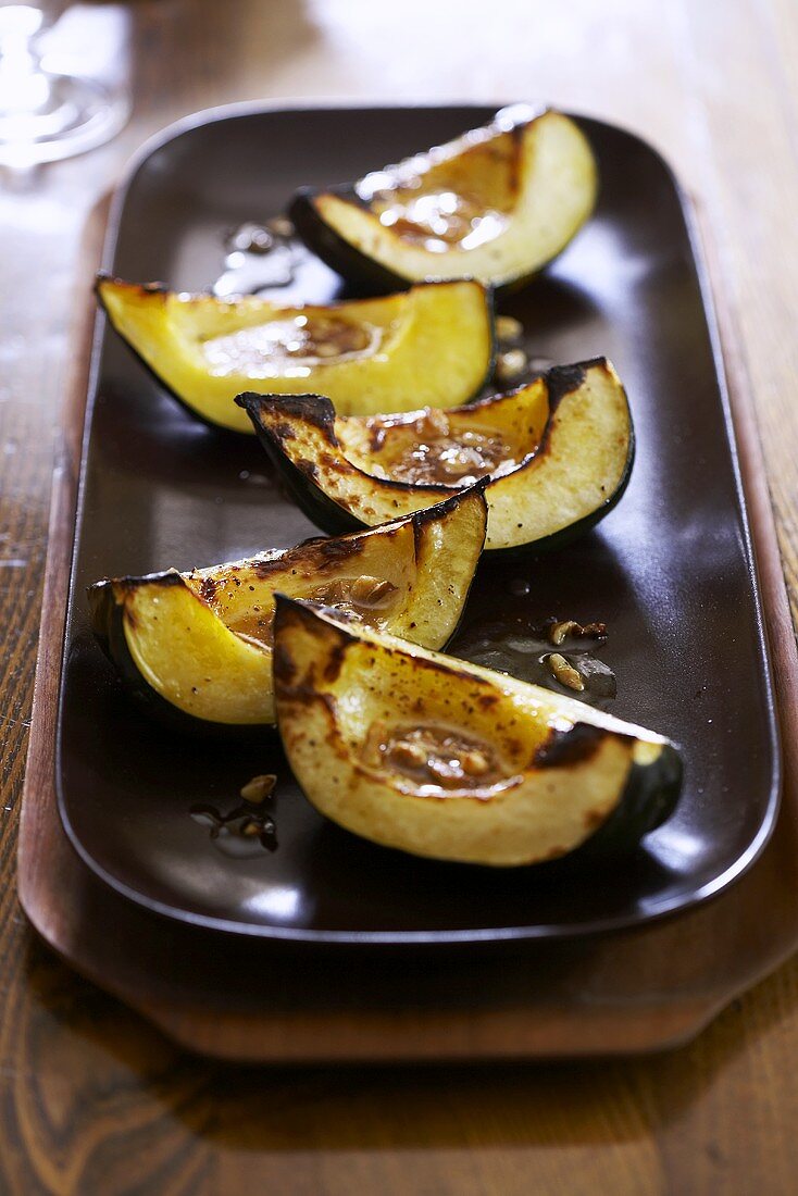 Quartered Roasted Acorn Squash on Platter