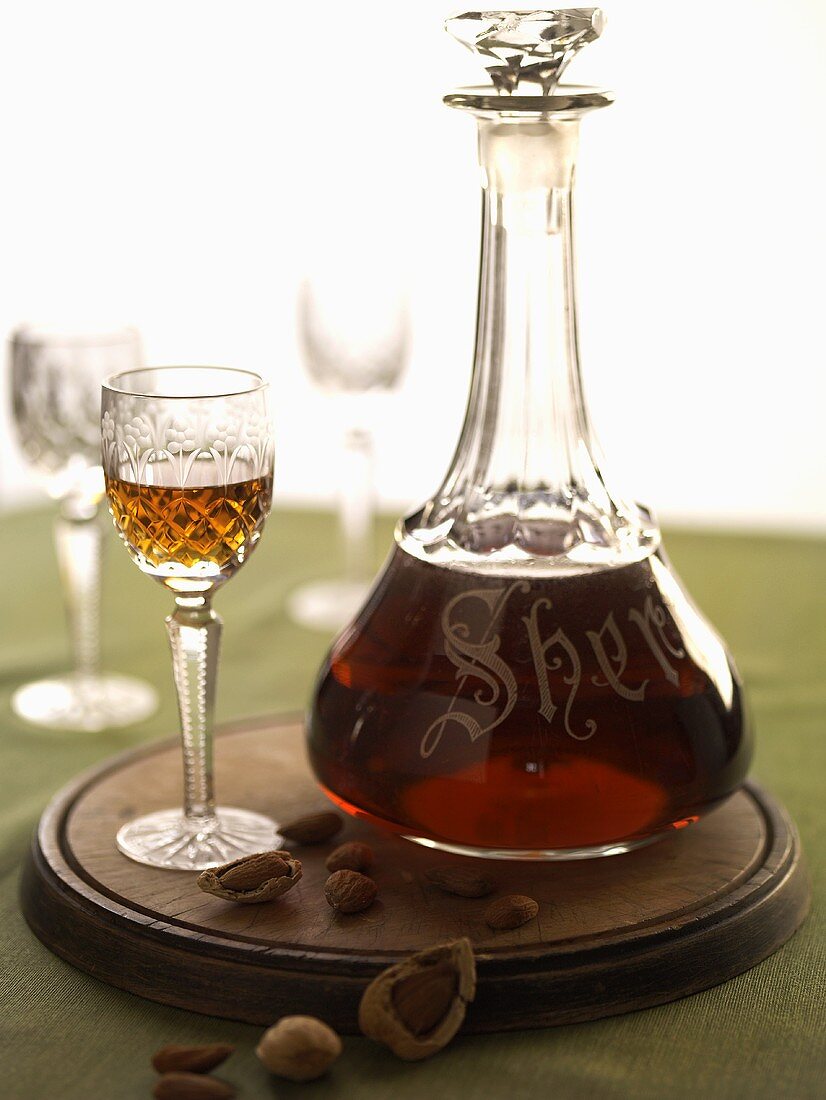 Glass and Caraf of Sherry; Nuts