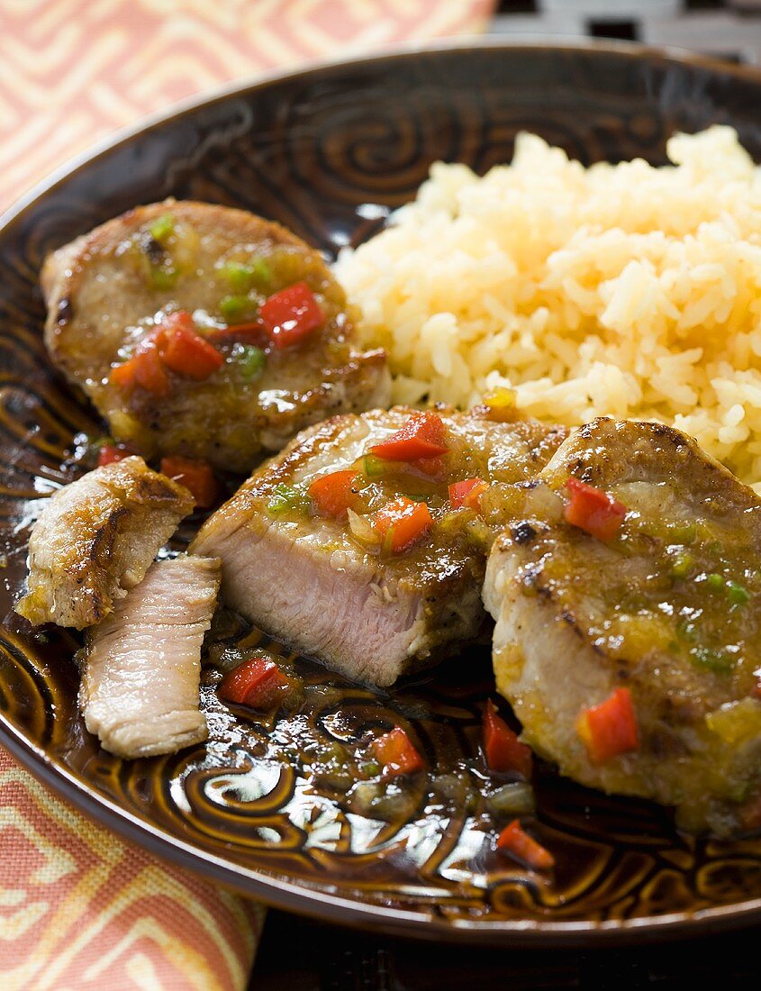 Caribbean Style Pork Tenderloin with Rice on a Plate