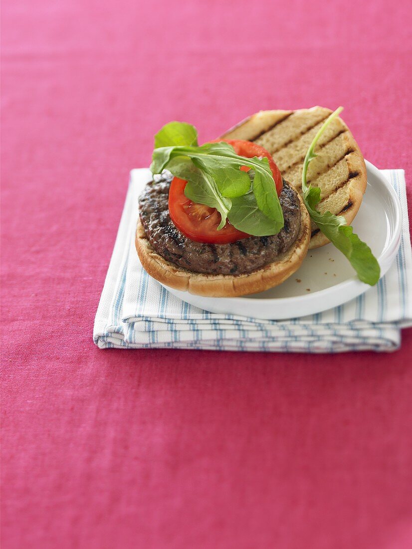 Grilled Burger with Tomato on Grilled Bun