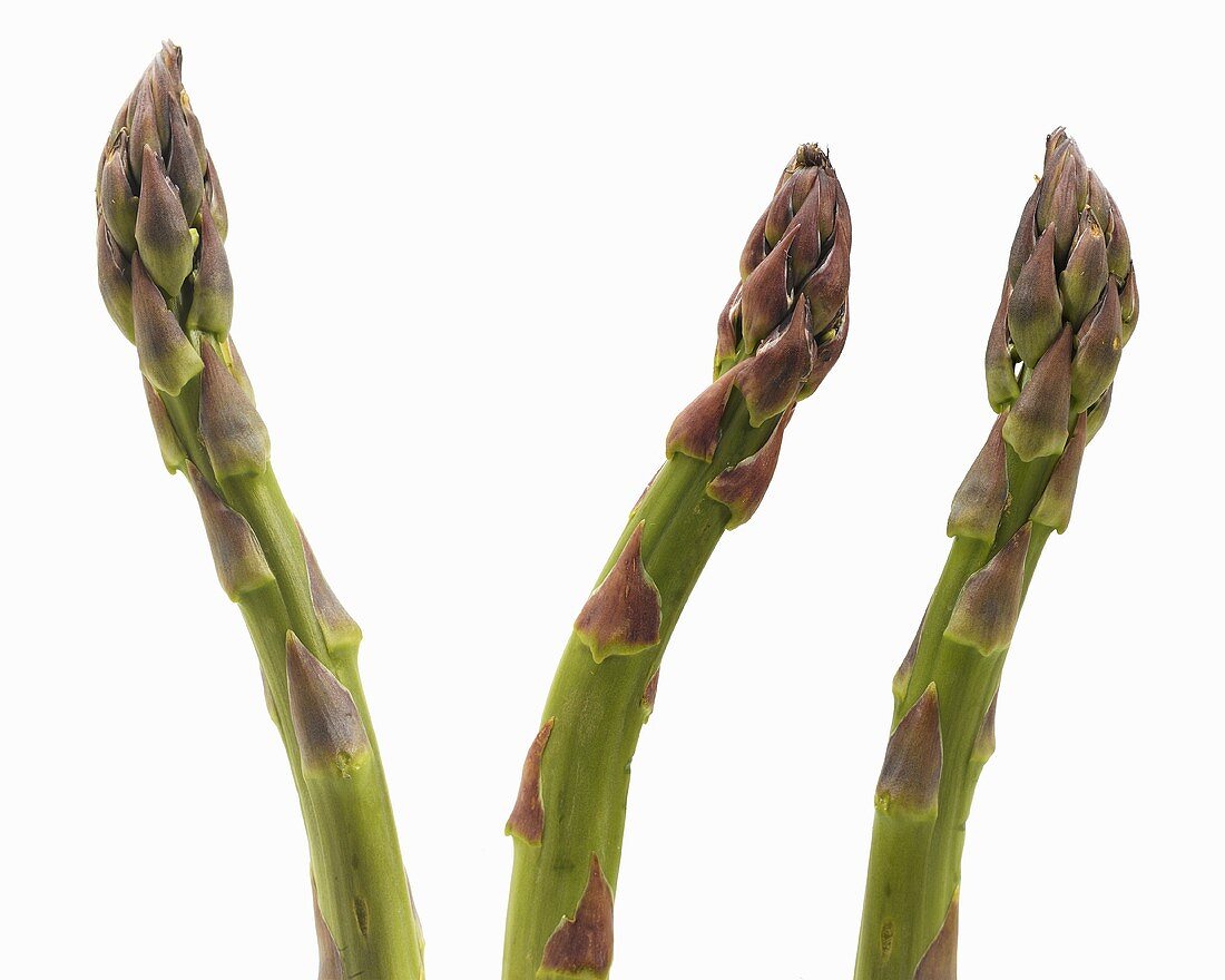 Three Asparagus Spears on White Background