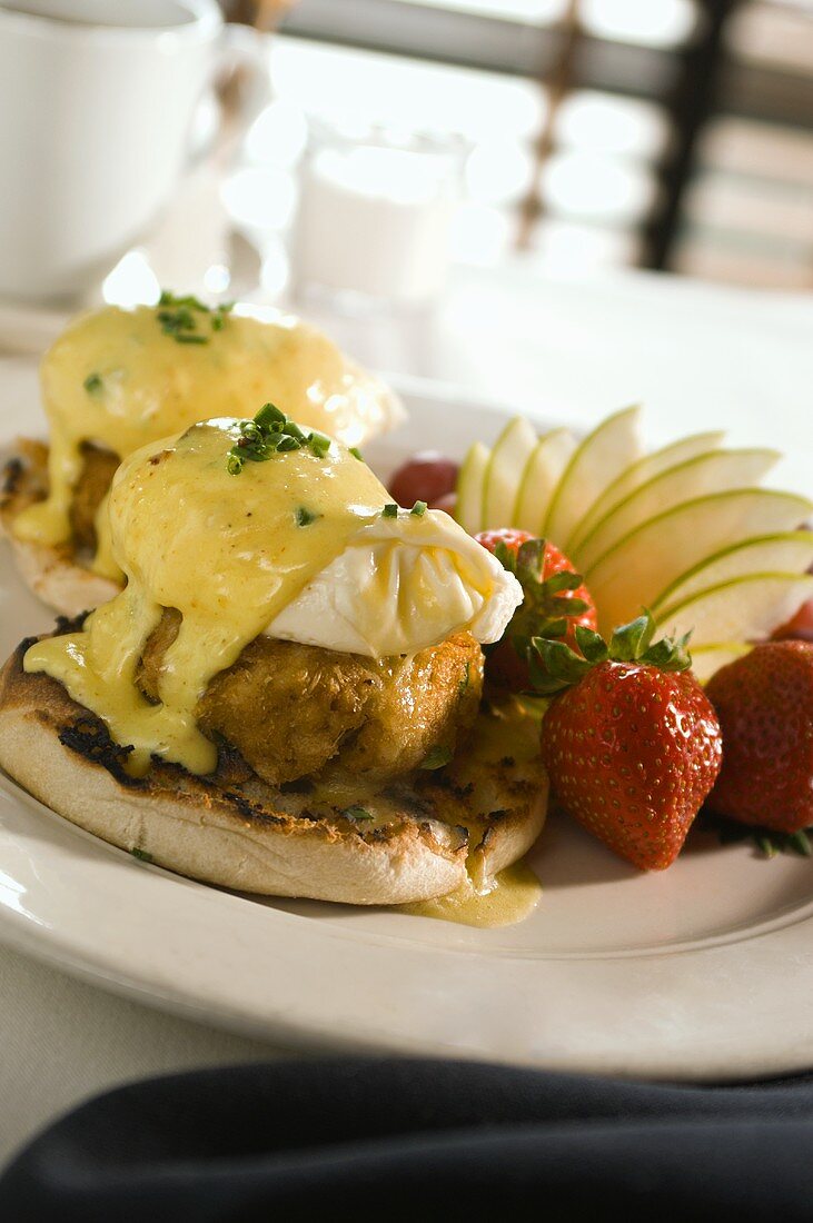 Eggs Benedict with Crab Cakes on Restaurant Table