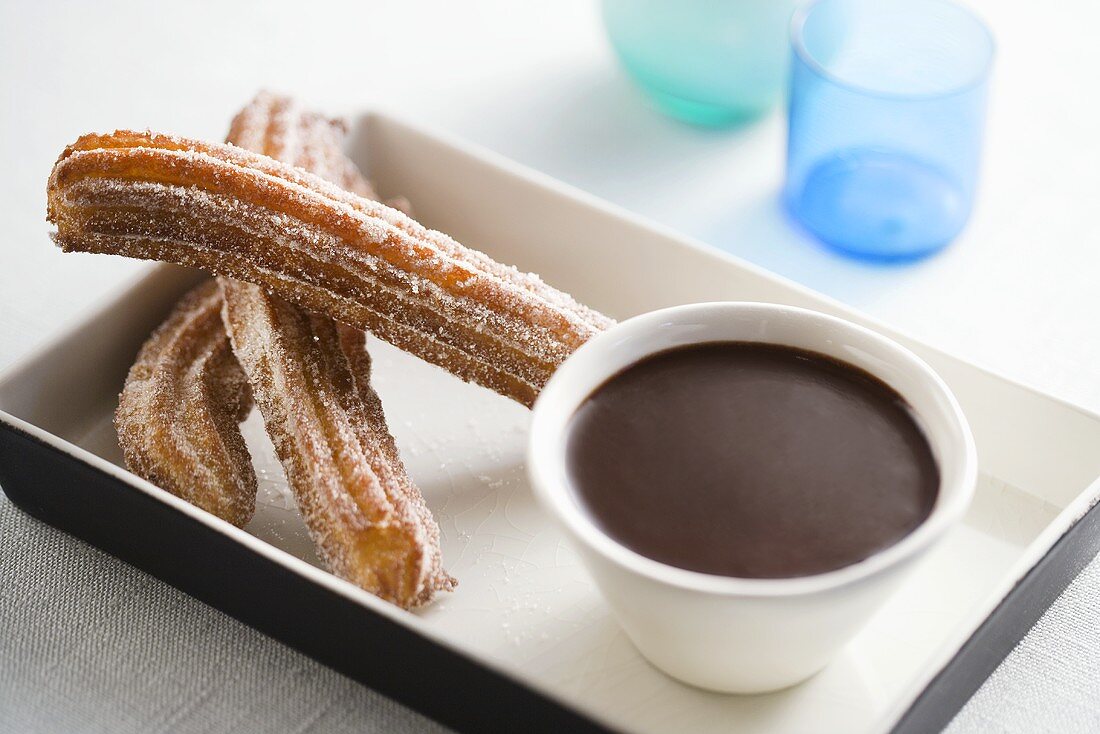 Fried Churros with a Bowl of Chocolate Sauce