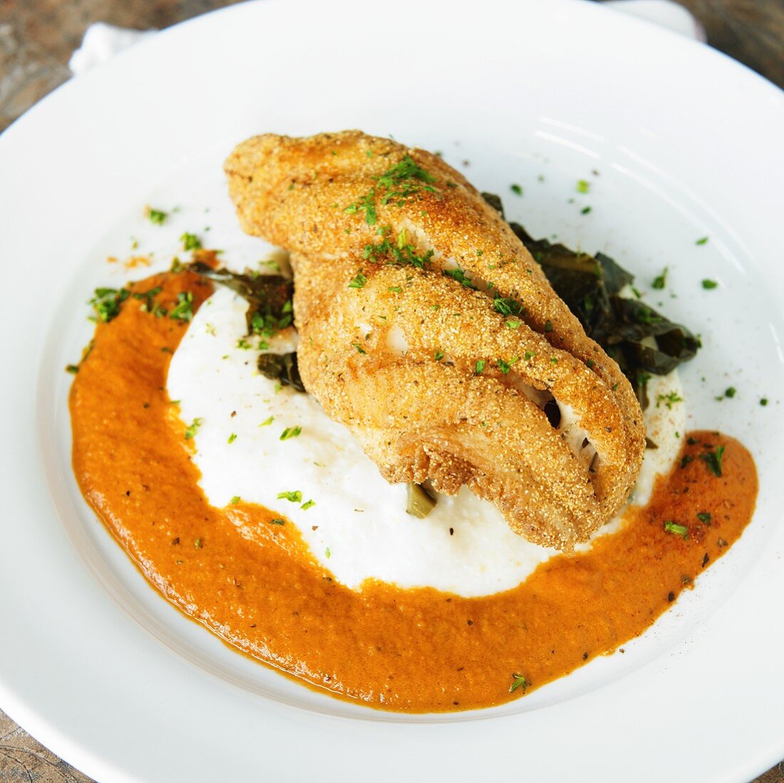 Fried Catfish with Grits and Tomato Cream Sauce
