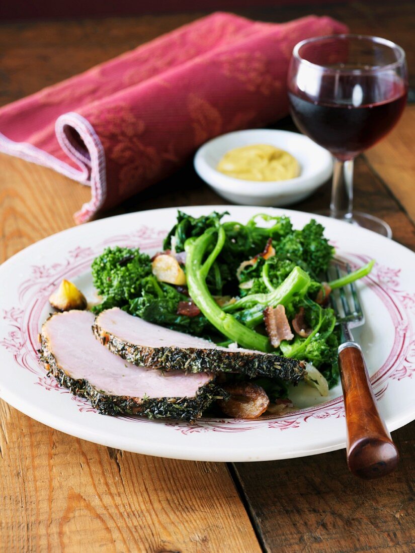 Rosemary Crusted Pork Tenderloin Slices with Broccoli Rabe