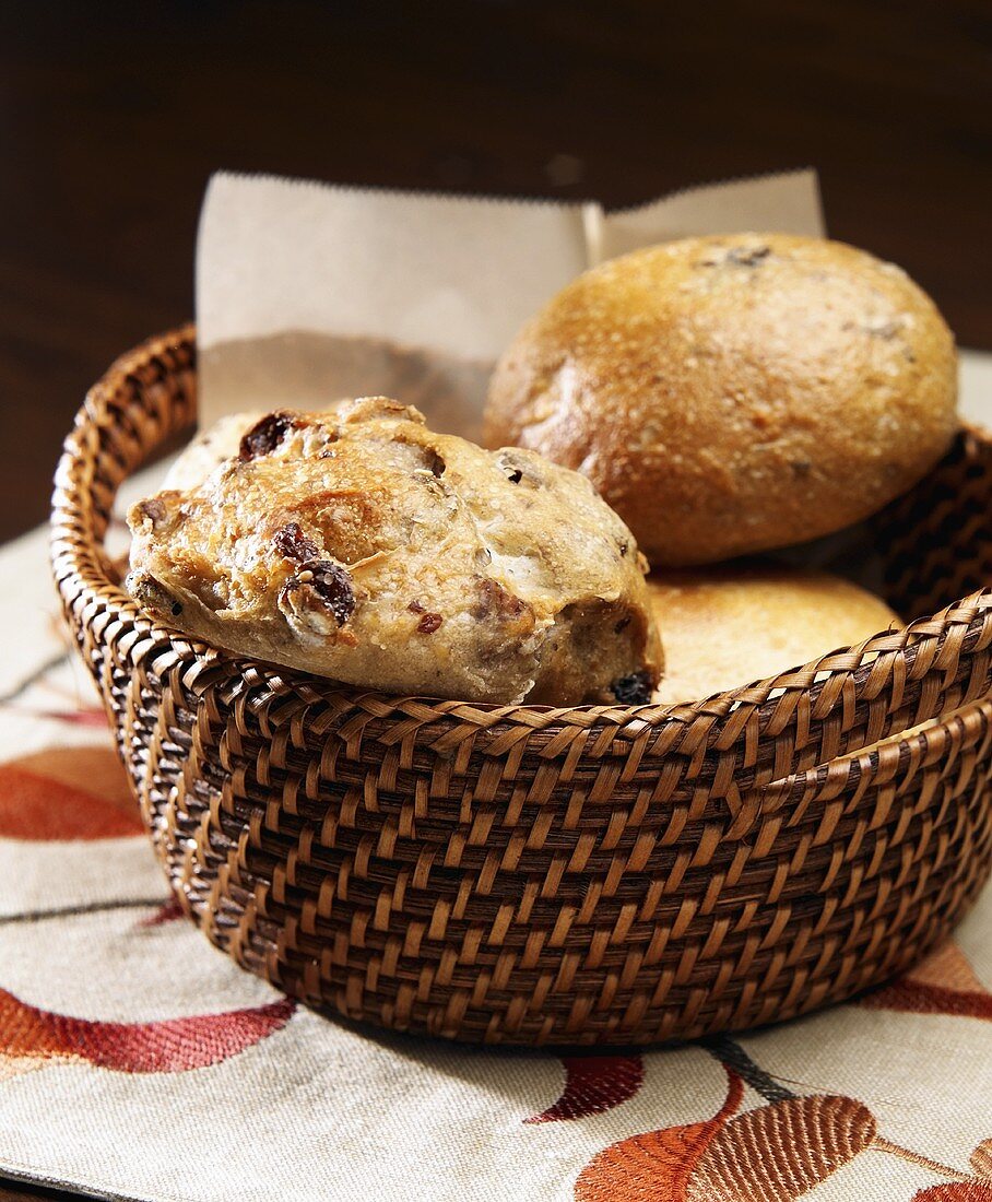 Variety of Rolls in a Basket; Olive, Pecan Raisin and Sourdough