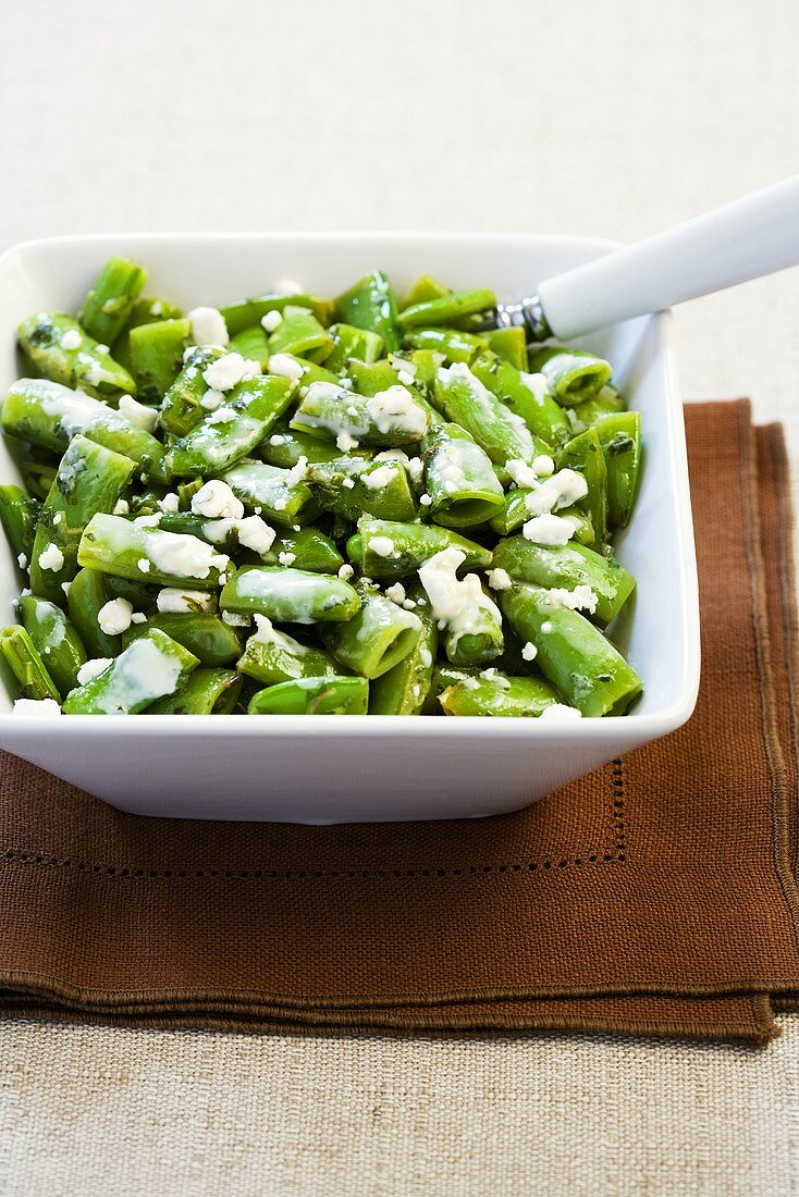 Bowl of Sugar Snap Peas with Goat Cheese and Mint