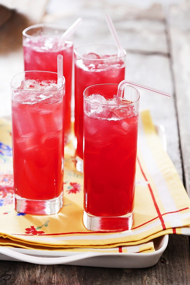 Four Raspberry Lime Rickies on a Tray