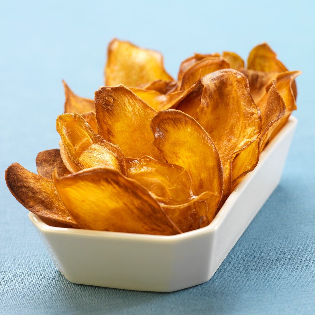 Fried Sweet Potato Chips in a White Dish