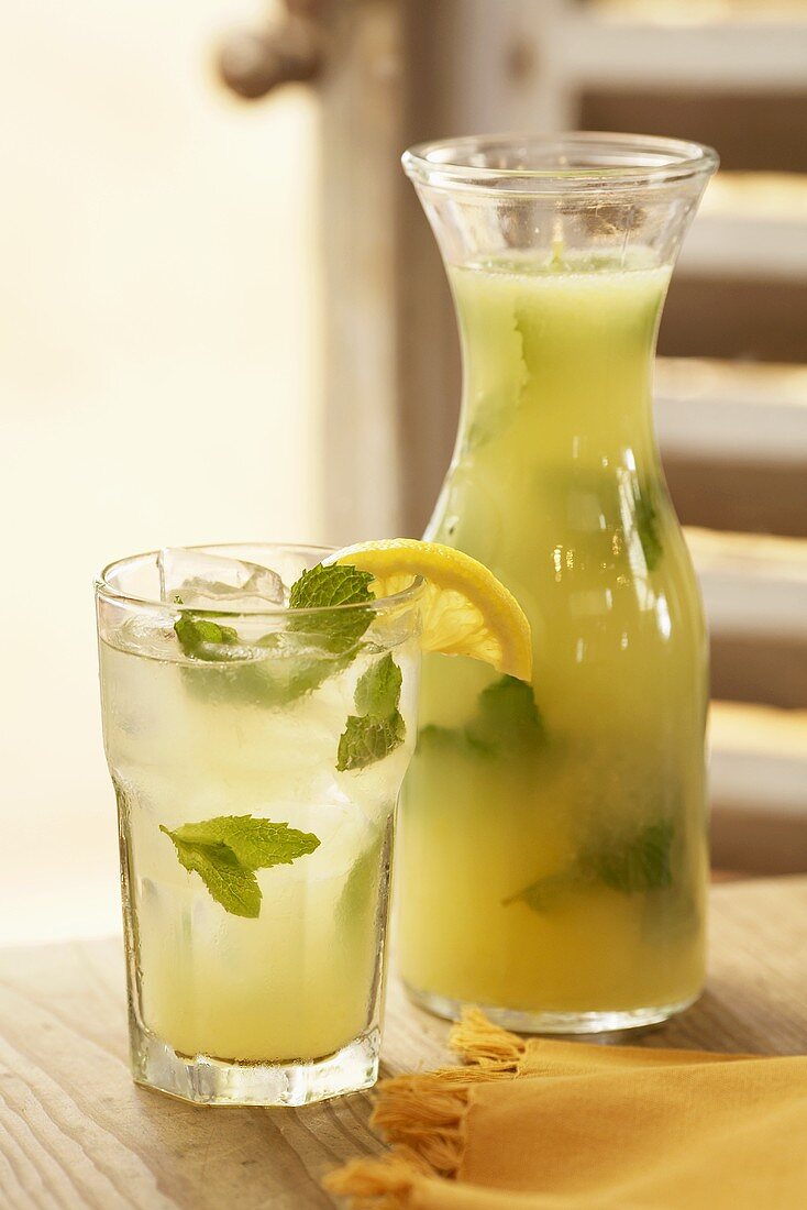 Glass and Carafe of Mint Lemonade 