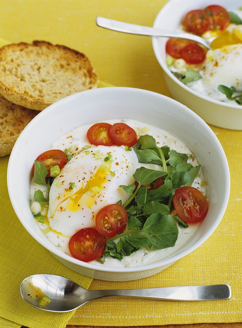 Poached Egg with Baked Yogurt, Watercress and Tomato; English Muffins; Spoons