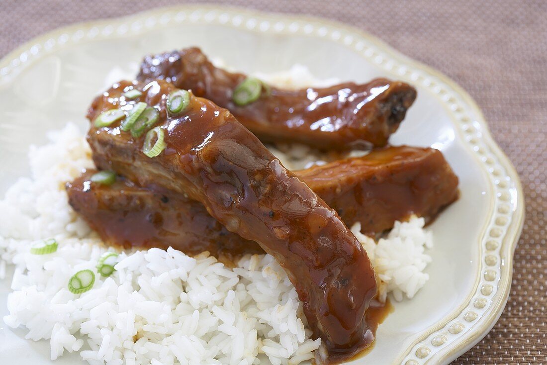 Plate of Slow Cooked Asian Style Ribs Over Rice