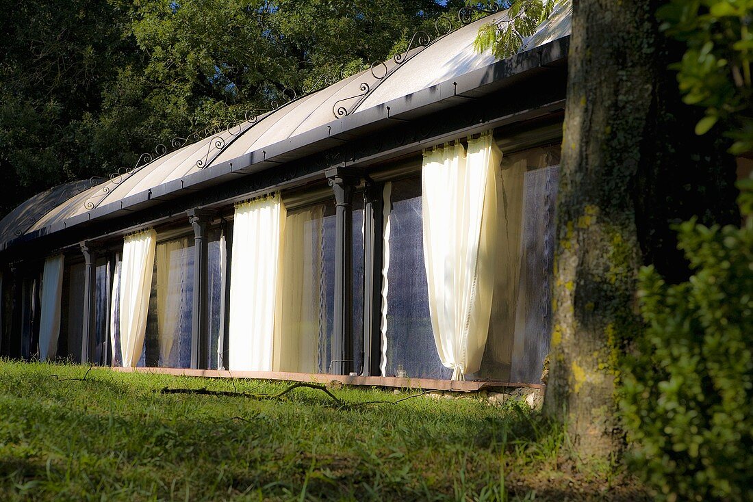 View of a house with outside curtains