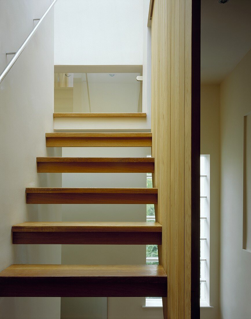 A narrow stairway with open steps