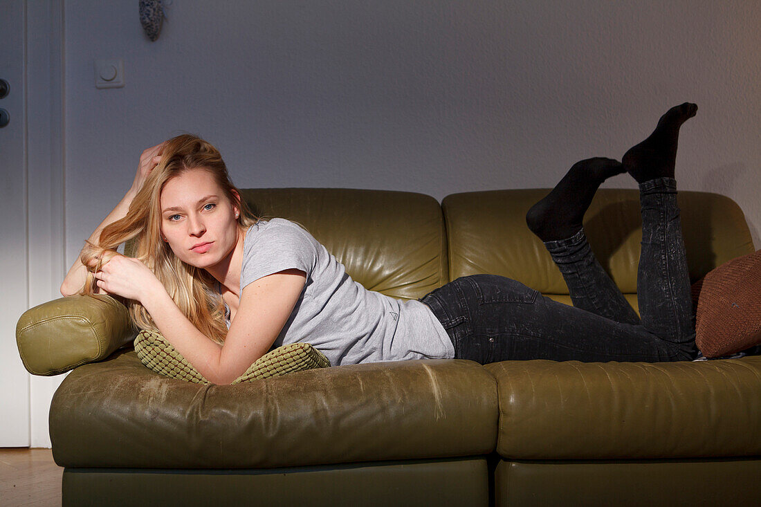 Woman lying on the sofa, relaxing