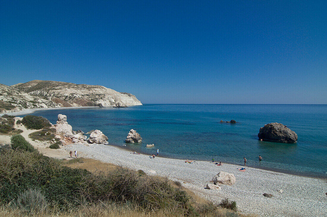 Pebble beach and coast at Petra tou Romiou, Aphrodites rock, Paphos, Cyprus