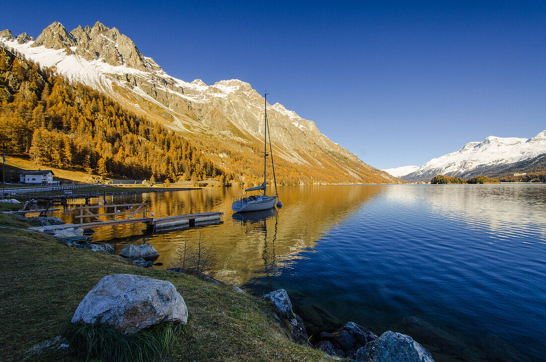 Sailing boat on Lake Sils, Plaun da Lej, Engadin, Grisons, Switzerland