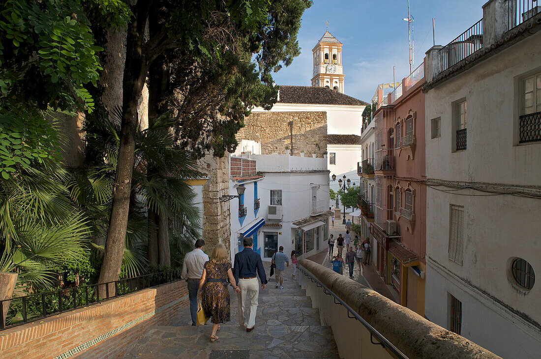 Steps and people in the old town of Marbella, Malaga province, Costa del Sol, Andalusia, Spain