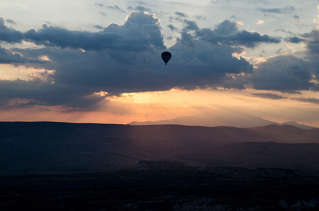 A Balloon in an early morning sky, Cappadocia, Turkey