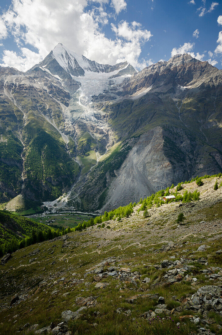 In front the tiny path leading to the Dom Hut, behind it the Europa Hut, with views of the Matter Valley, the Weisshorn, Bishorn and Brunegghorn, from left to right, Pennine Alps, canton of Valais, Switzerland