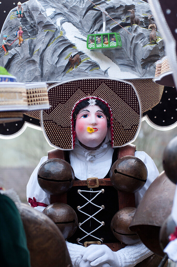 A man dressed as a female Silvesterklaus celebrating the custom of Silvesterklausen to celebrate the turn of the year in the village of Urnaesch, canton of Appenzell Ausser Rhoden, Switzerland