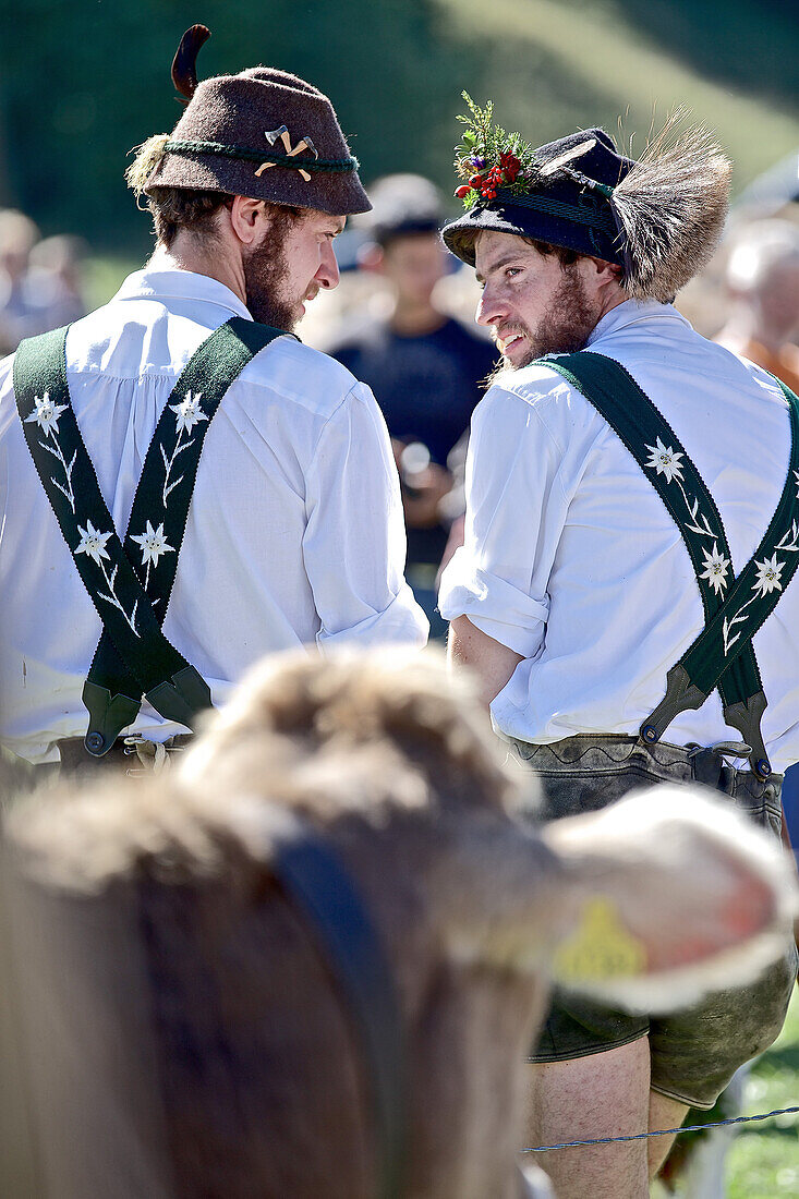 Two men wearing traditional clothes, Viehscheid, Allgau, Bavaria, Germany