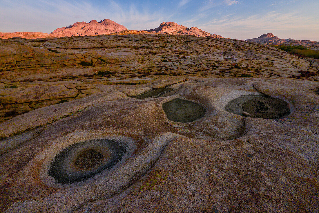 Desert landscape and natural basins in granite mountains of Bektau Ata, Sary Arka, Qaraghandy, Karaganda Region, Kazakhstan, Central Asia, Asia