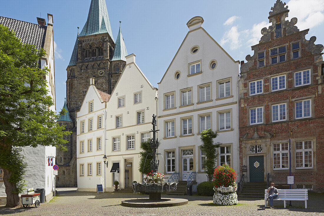 Houses at the market place and St Laurentius' church at Warendorf , Muensterland , North Rhine-Westphalia , Germany , Europe