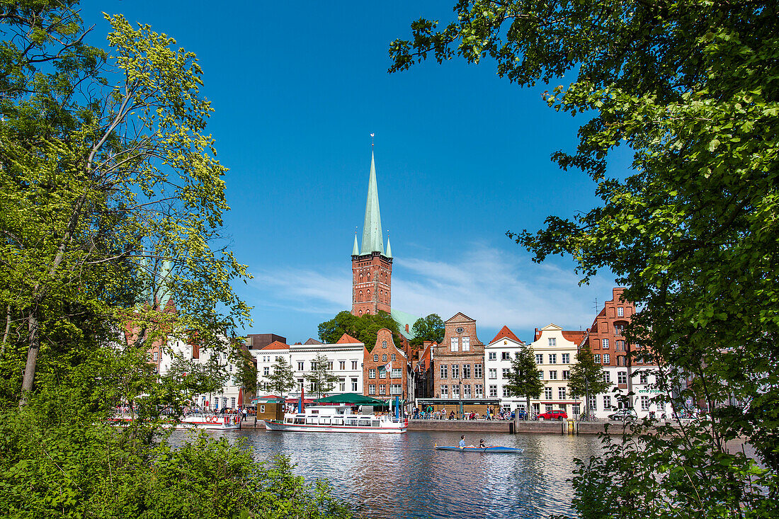 View from Marlerwinkel over river Trave towards the old town and towards the church of St. Peter, Hanseatic City, Luebeck, Schleswig-Holstein, Germany