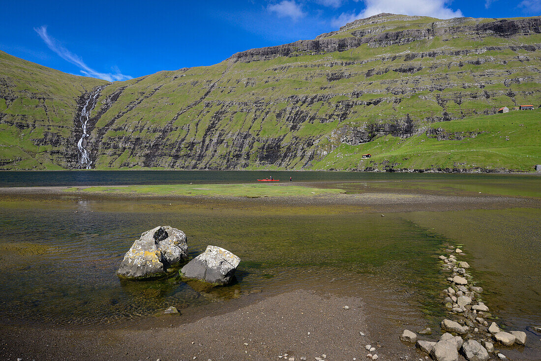 Waterfall and lake in Saksun, Streymoy Island, Faroe Islands