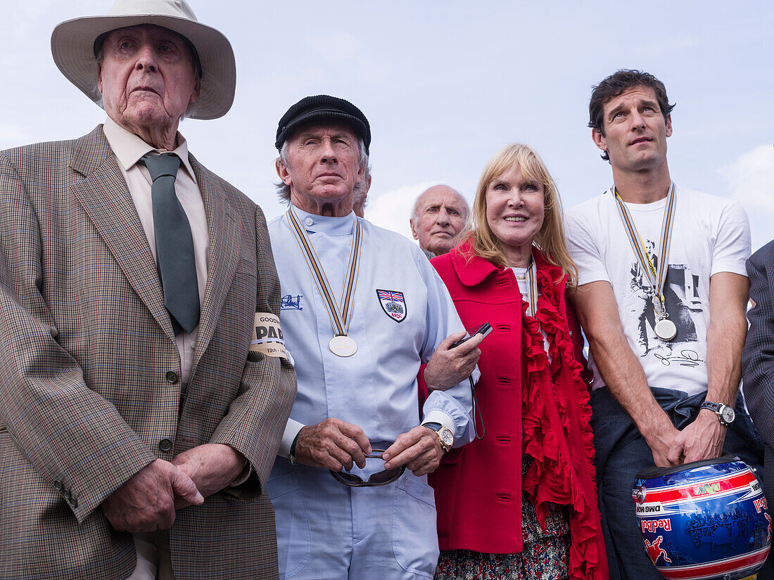 Sir Jackie Stewart (ML), Lady Helen Stewart (MR), Mark Webber (R), Goodwood Revival 2014, Racing Sport, Classic Car, Goodwood, Chichester, Sussex, England, Great Britain