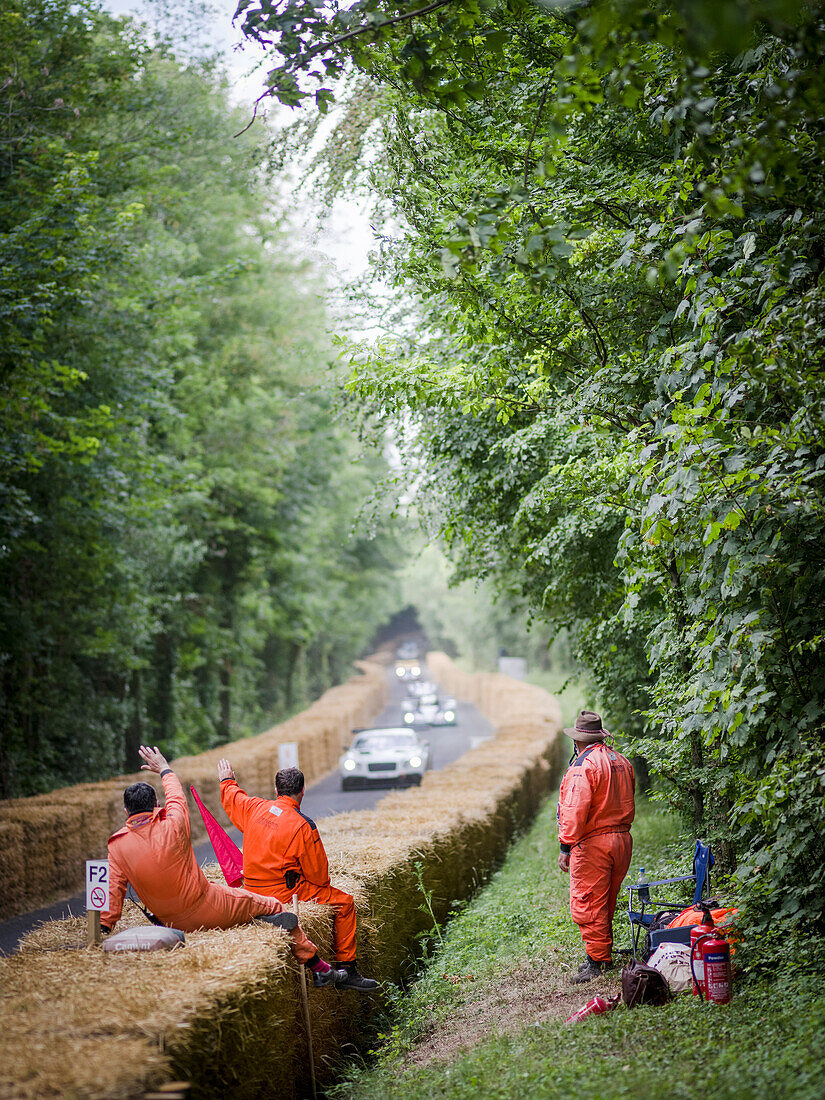 Track marshals, Goodwood Festival of Speed 2014, racing, car racing, classic car, Chichester, Sussex, United Kingdom, Great Britain