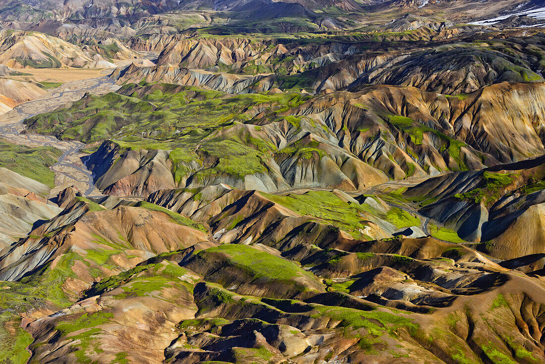 Aerial view of a river valley with meanders of  glacial river Tungnaa and colorful rhyolith mountains, Landmannalaugar, Highlands, South Iceland, Iceland, Europe