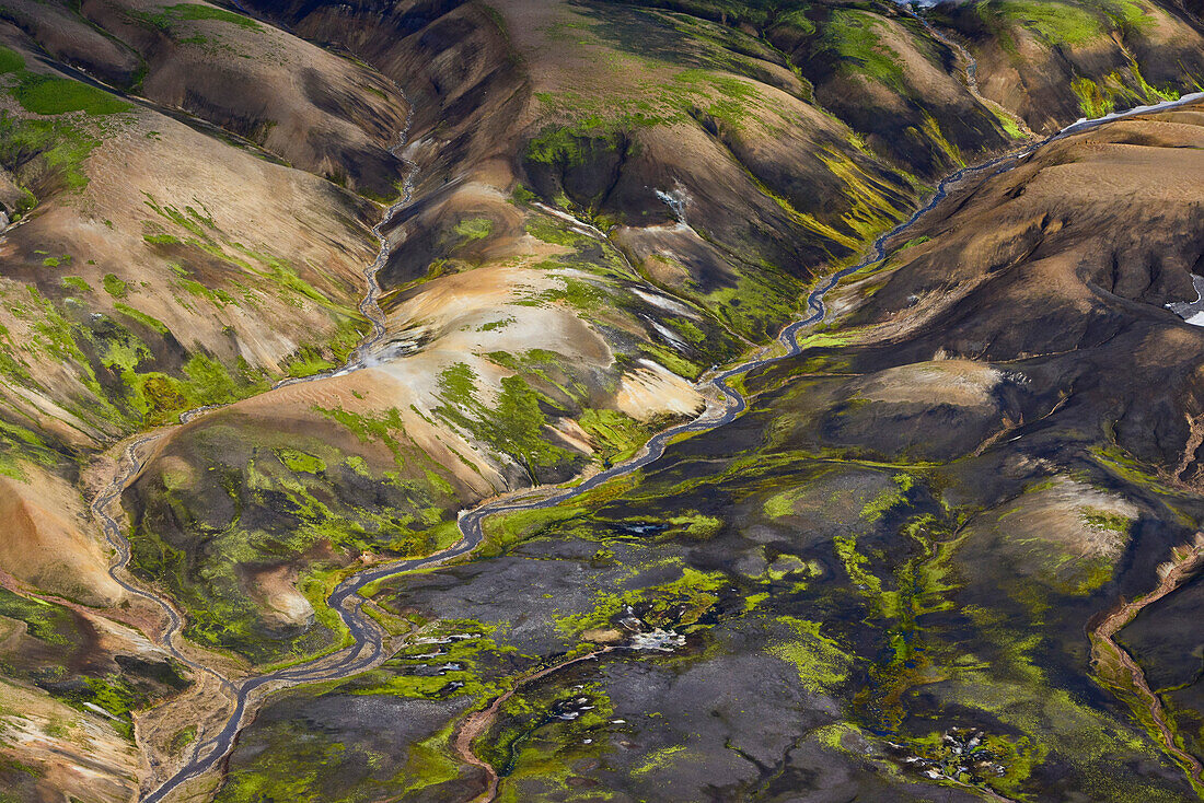 Aerial view of a river valley with a glacial river and colorful rhyolith mountains, Landmannalaugar, Highlands, South Iceland, Iceland, Europe