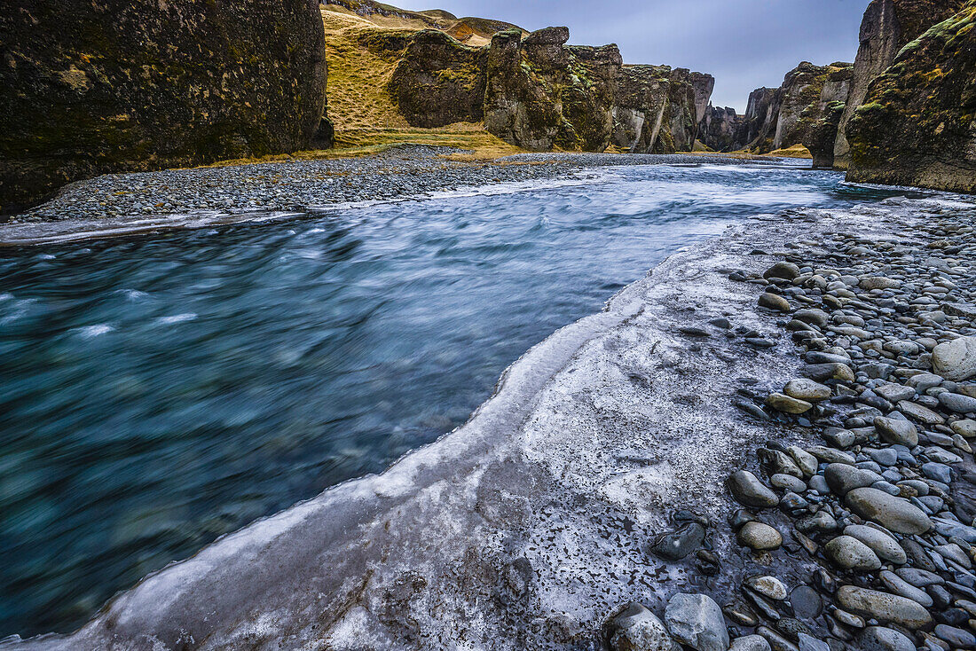 Fjadrargljufur gorge with moos covered canyon walls and river bed of Fjadra, near Kirkjubaejarklaustur, Southern Iceland, Iceland, Europe