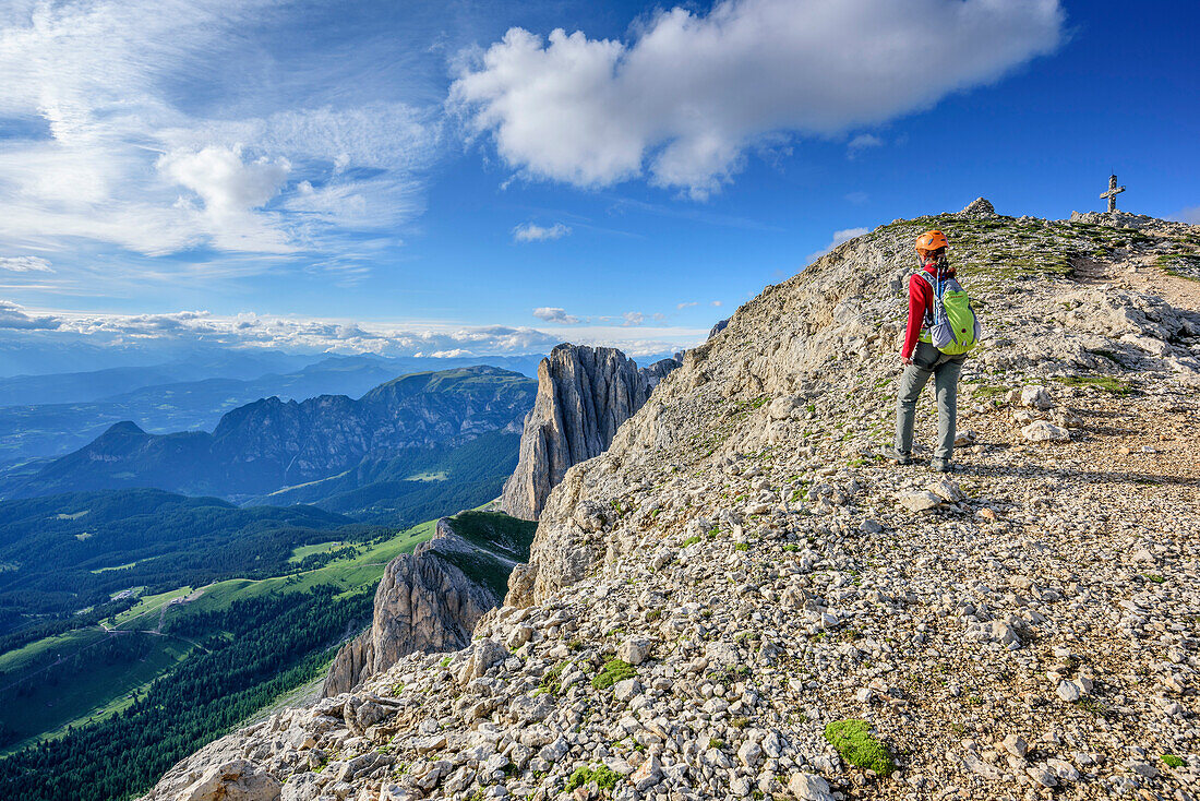 Woman ascending towards Rotwand, Rotwand, Rosengarten, UNESCO world heritage Dolomites, Dolomites, Trentino, Italy