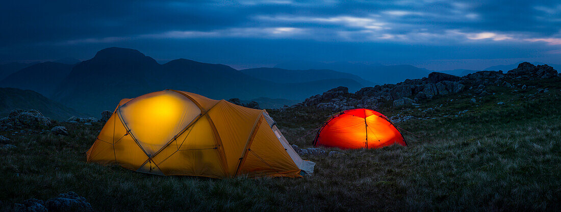Camp tents in rocky rural landscape, Keswick, Cumbria, United Kingdom, Keswick, Cumbria, UK